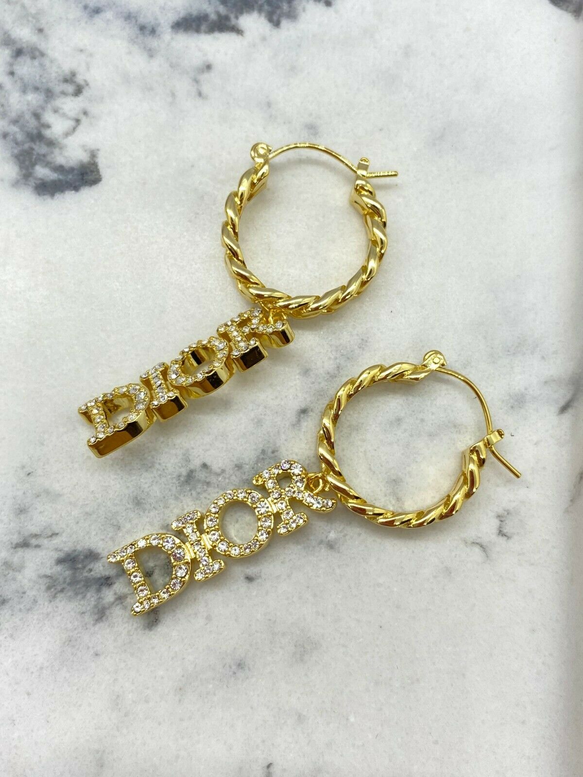 CHRISTIAN DIOR Gold Tone Rhinestone Pendant Earrings - Pre owned