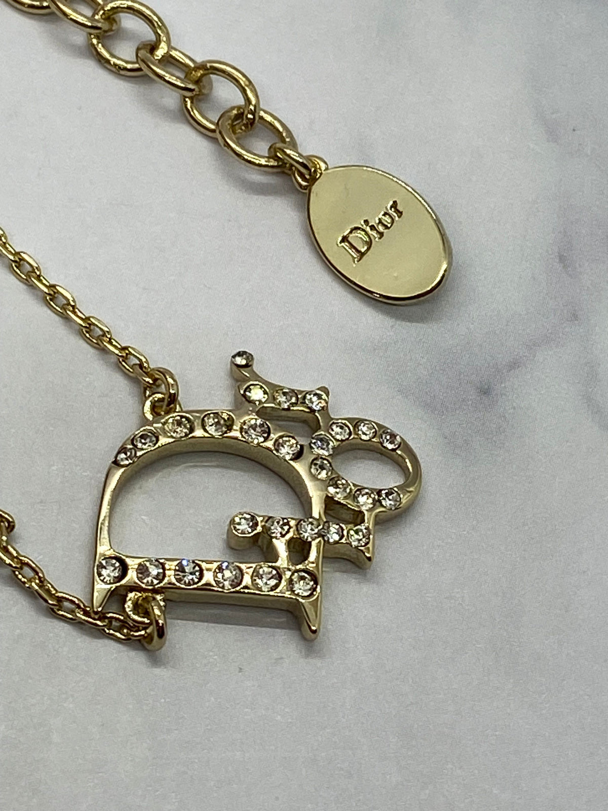 CHRISTIAN DIOR Silver Tone Rhinestone Monogram Necklace- Pre owned