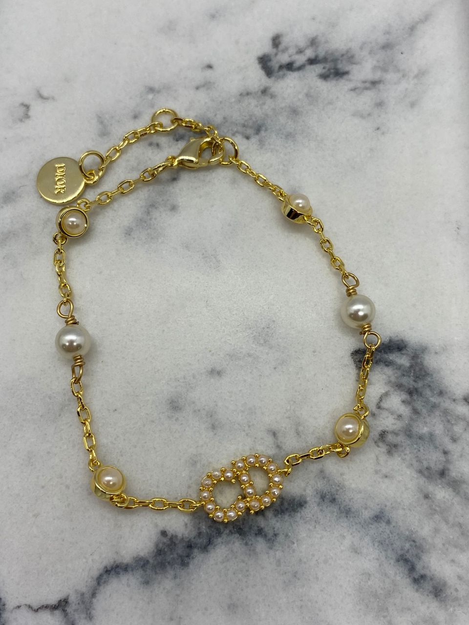 CHRISTIAN DIOR CD Rhinestone Trim Gold Tone Bracelet - Pre owned