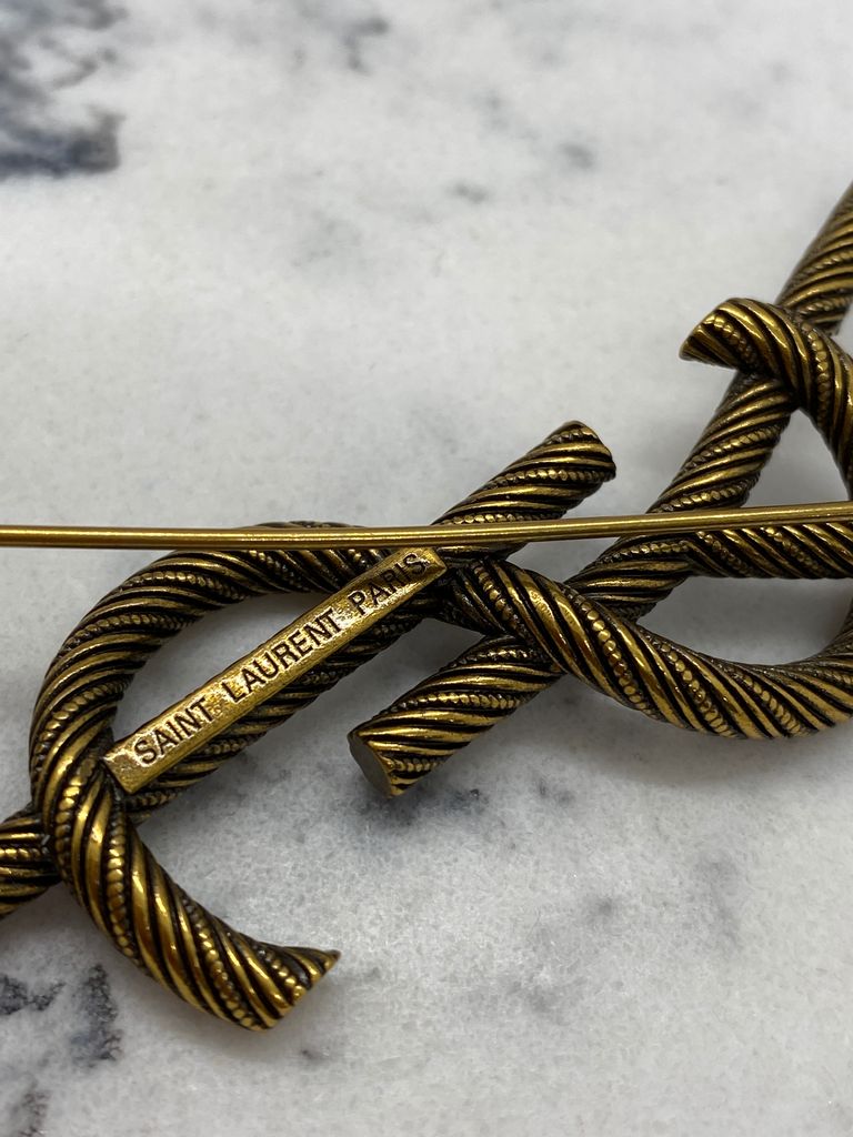 YSL Saint Laurent Brass Tone Monogram Brooch Pin - Pre owned