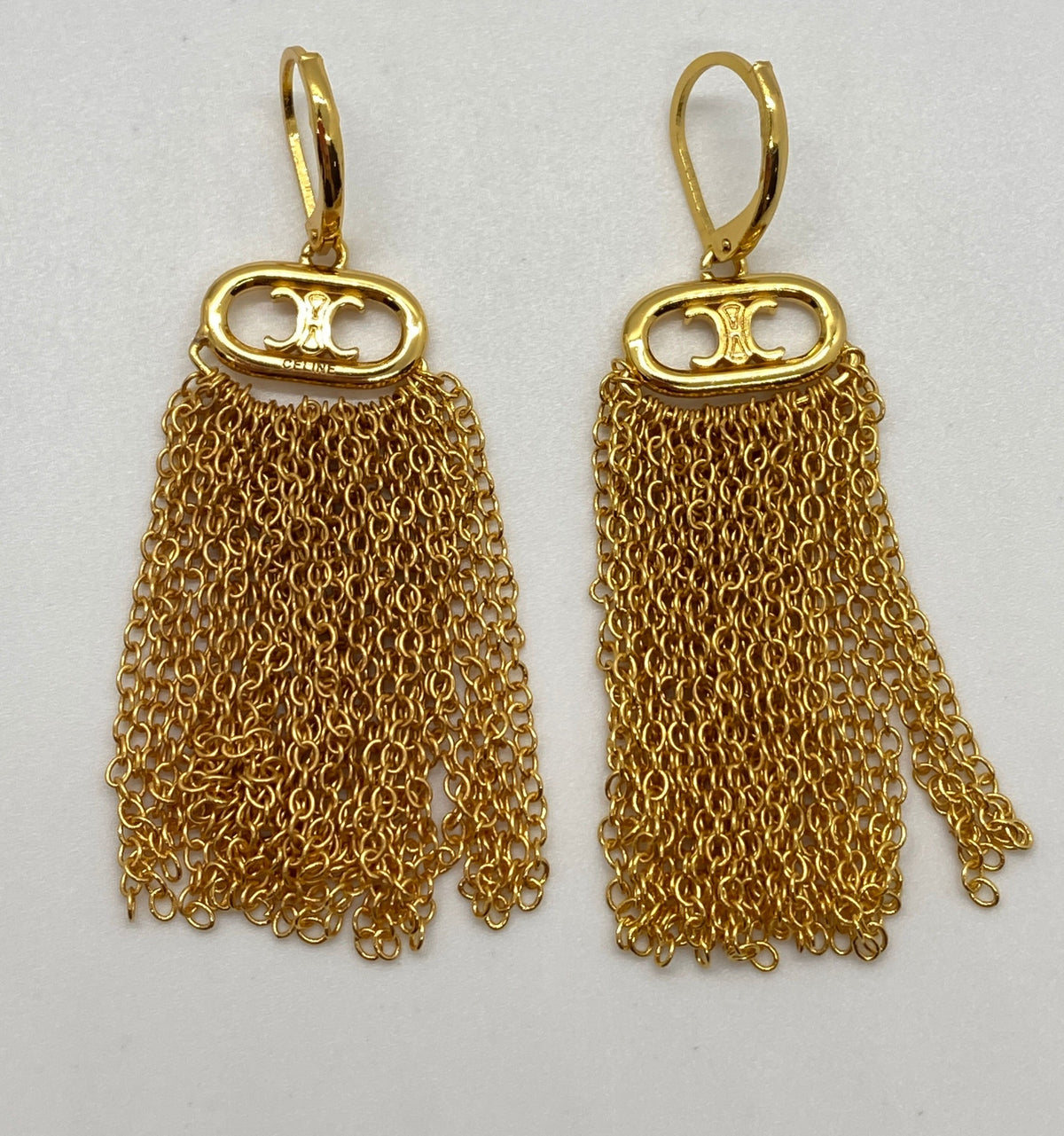 CELINE Gold Tone Fringe Monogram Pendant Earrings - Pre owned