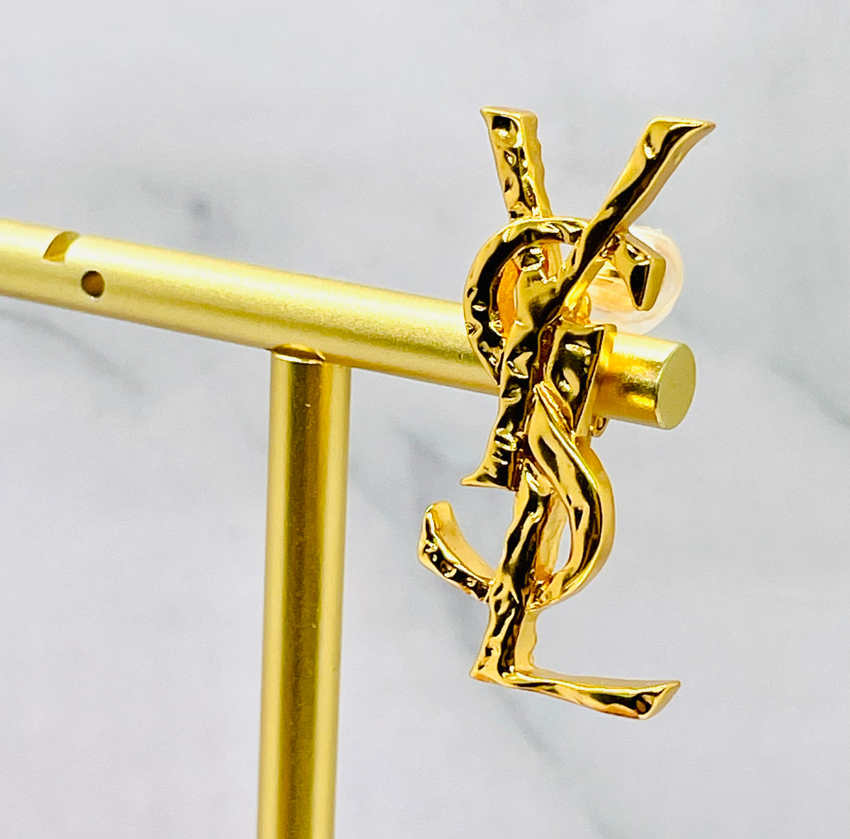 YSL YVES SAINT LAURENT Cassandre hammered single clip earring