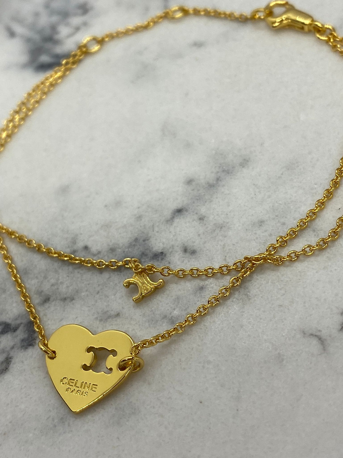 CELINE Gold Tone Heart Monogram Charm Bracelet - Pre owned