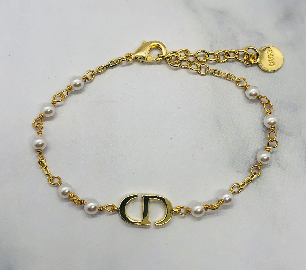 CHRISTIAN DIOR CD Pearl Trim Gold Bracelet - Pre owned