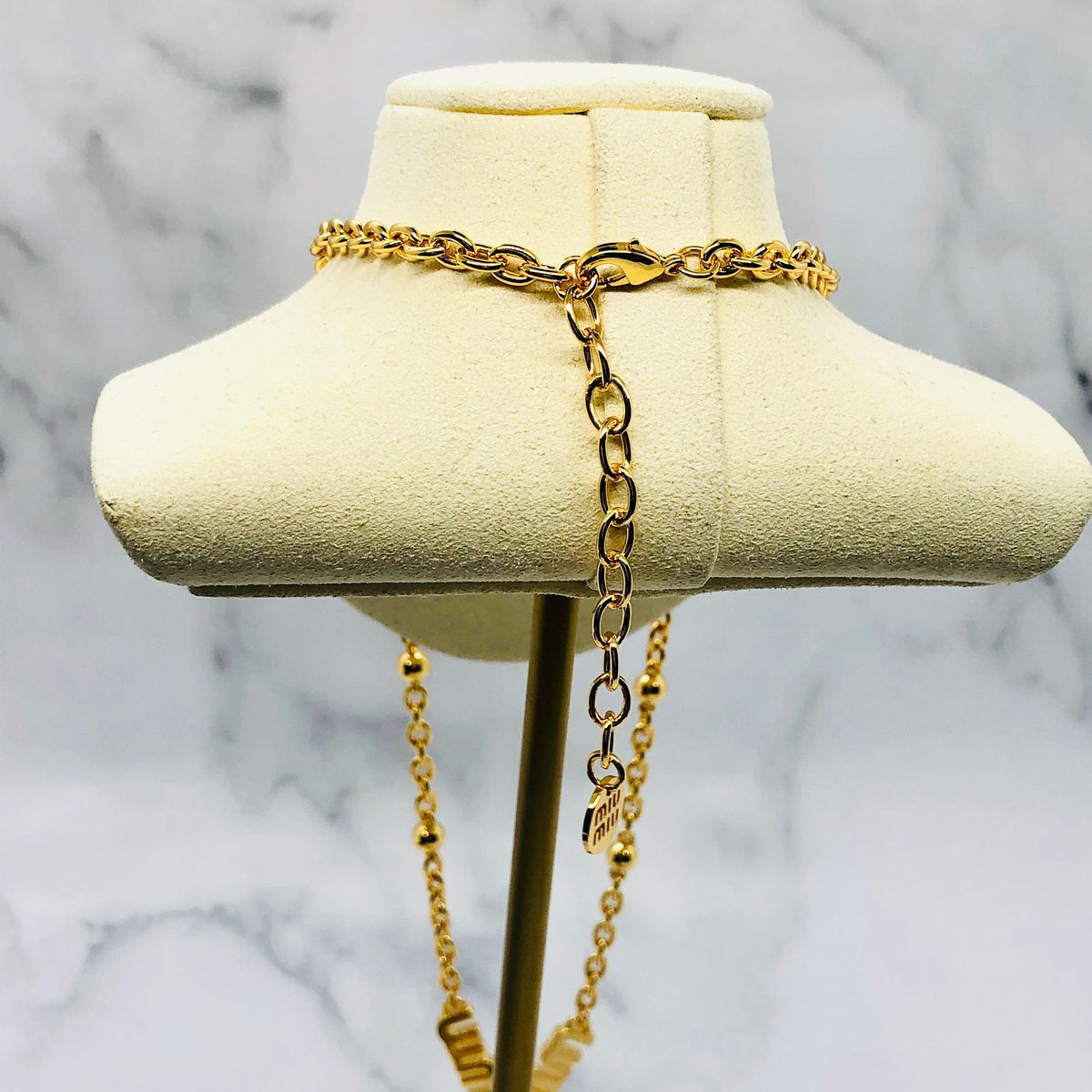 MIU MIU Gold Tone Monogram Necklace - Pre owned
