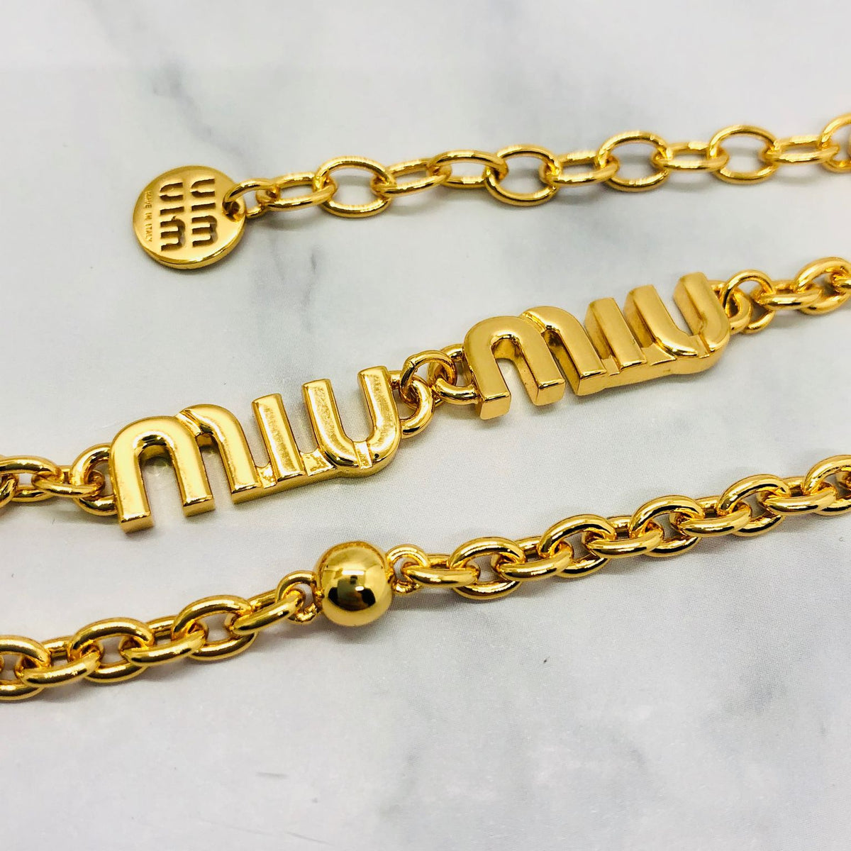 MIU MIU Gold Tone Monogram Bracelet - Pre owned