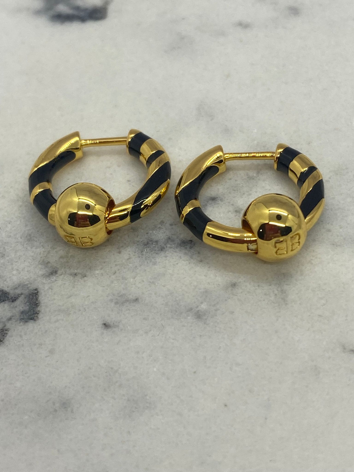 BALENCIAGA BB Gold Tone Black Strip Hoop Earrings - Pre owned