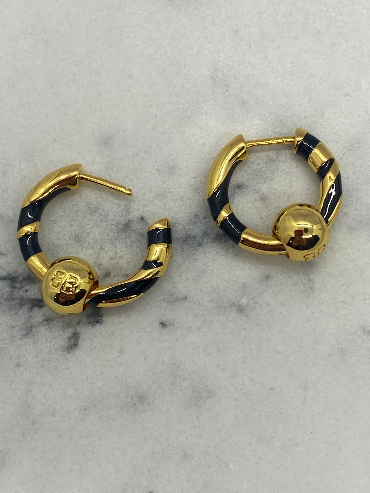 BALENCIAGA BB Gold Tone Black Strip Hoop Earrings - Pre owned