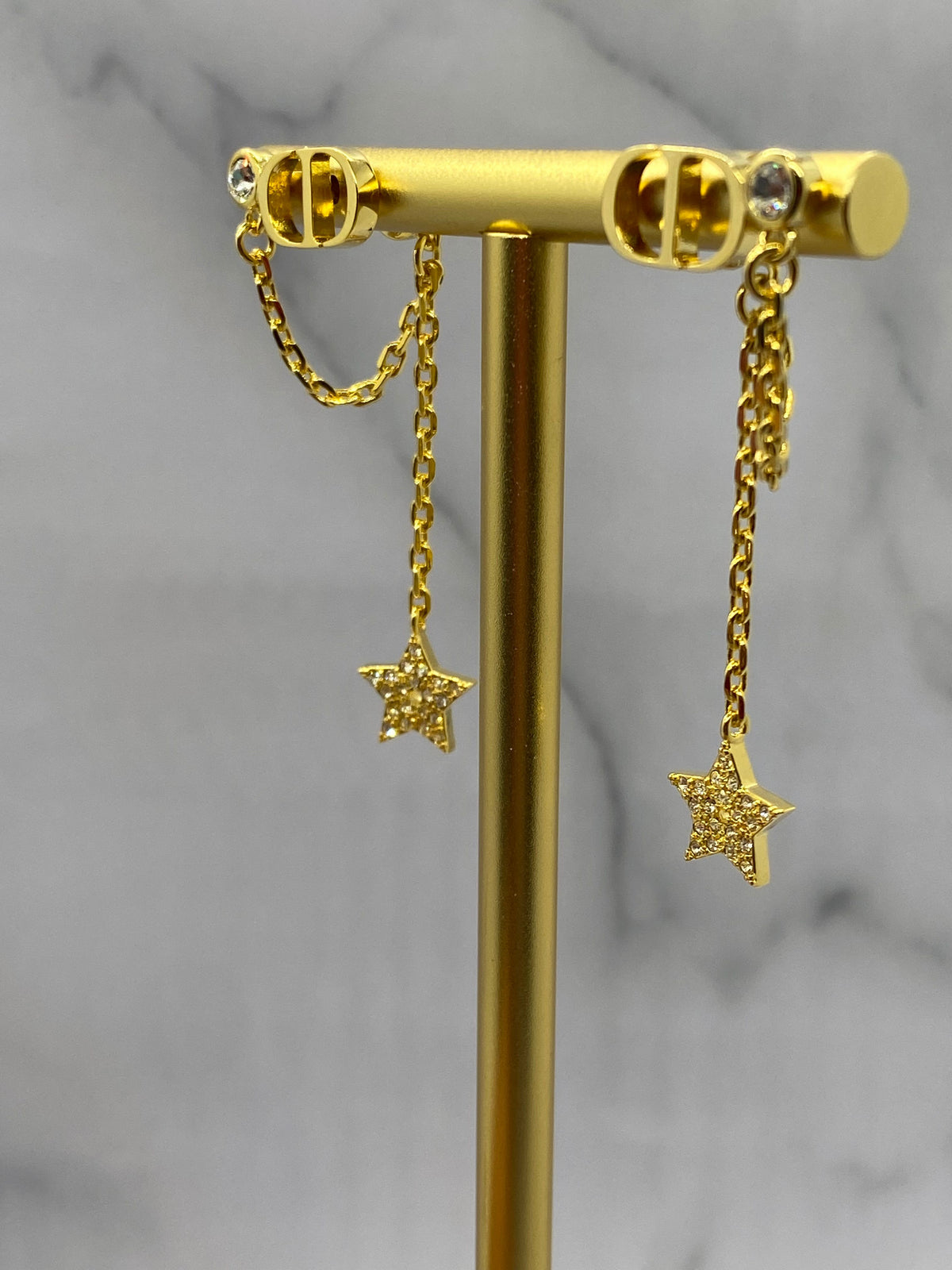 CHRISTIAN DIOR CD Gold Tone Star Pendant Earrings - Pre owned