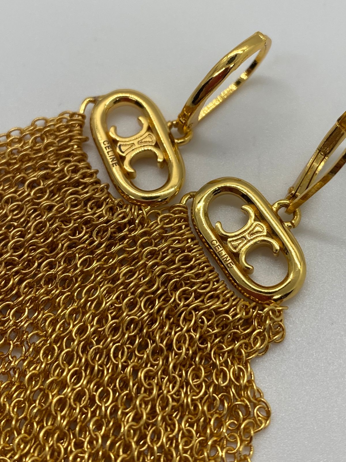 CELINE Gold Tone Fringe Monogram Pendant Earrings - Pre owned