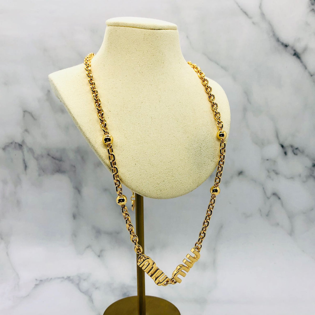 MIU MIU Gold Tone Monogram Necklace - Pre owned