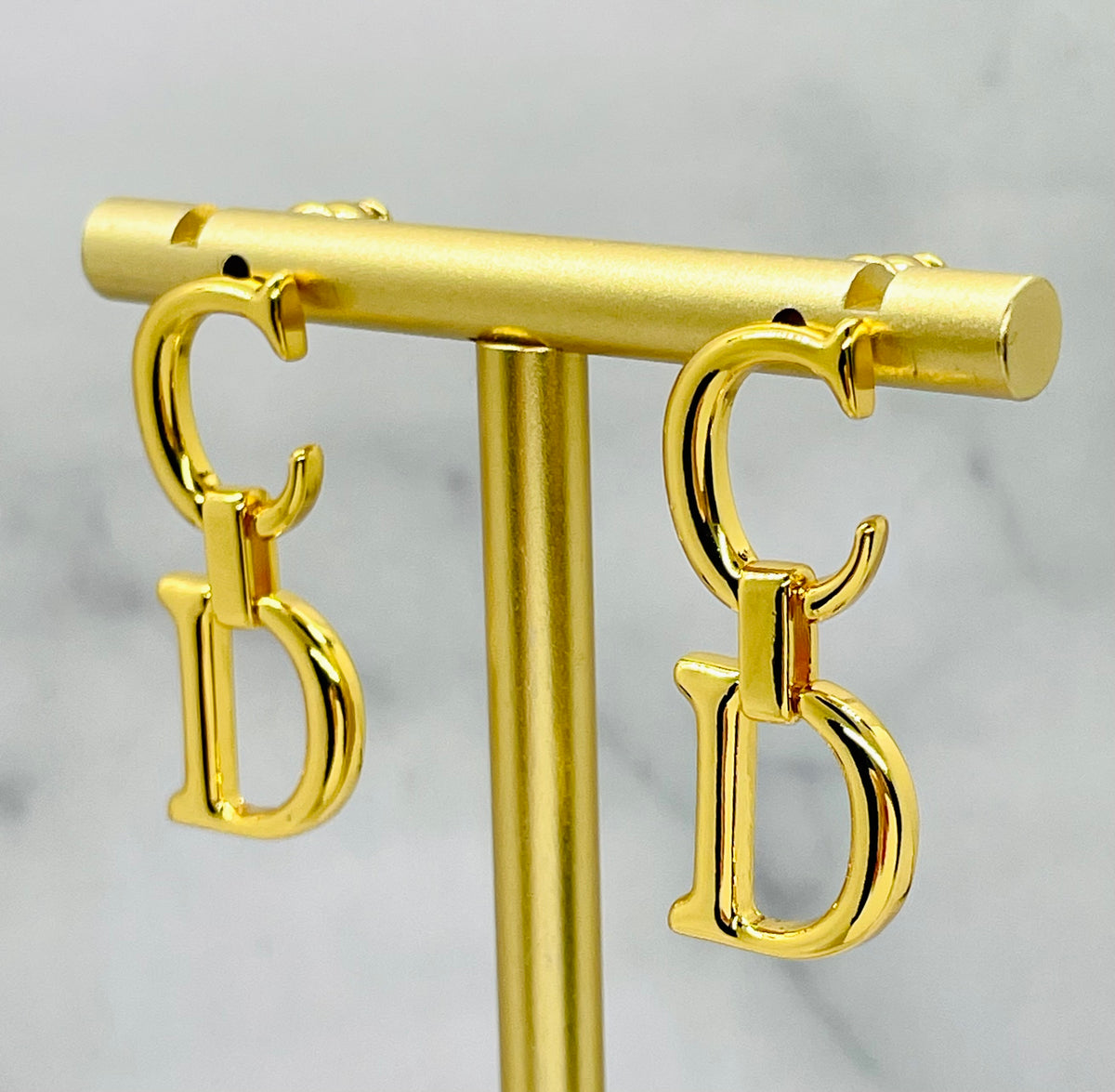 CHRISTIAN DIOR CD Gold Tone Pendant Earrings - Pre owned