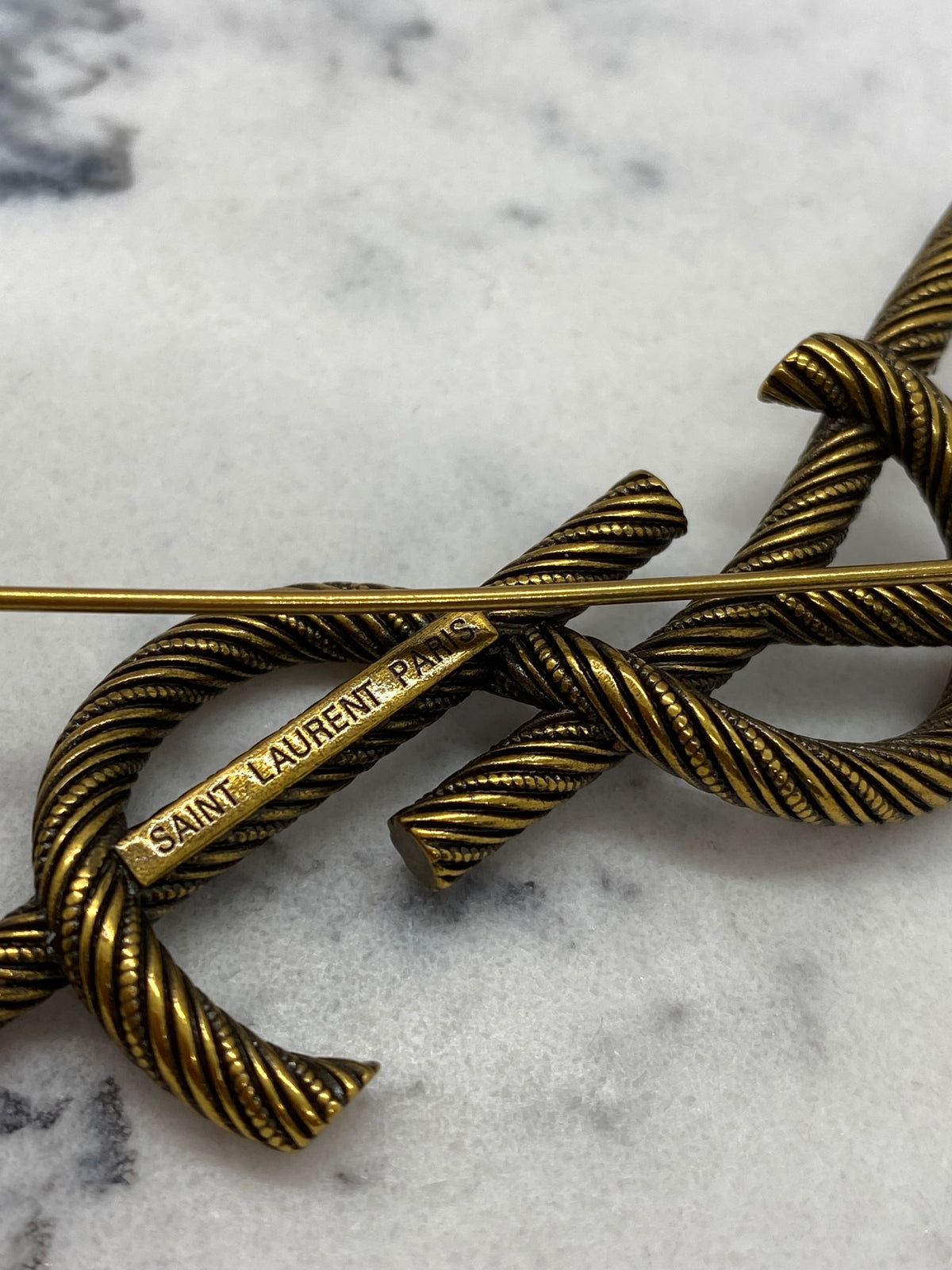 YVES SAINT LAURENT Brass Tone Monogram Brooch Pin - Pre owned
