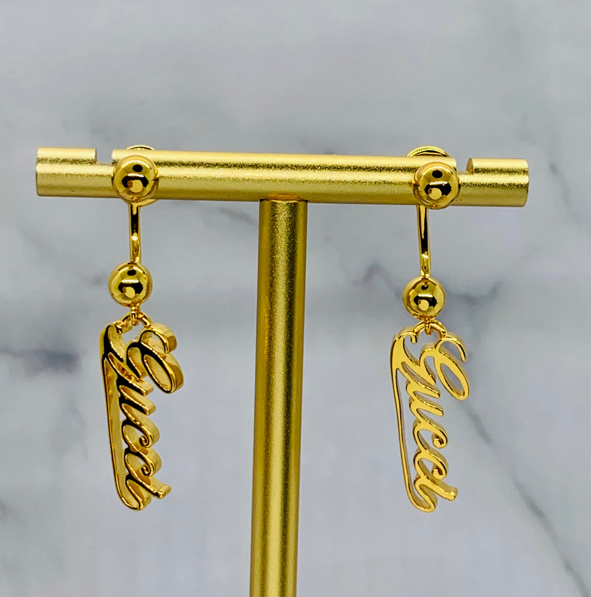 GUCCI Signature Gold Tone Pendant Earrings - Pre owned