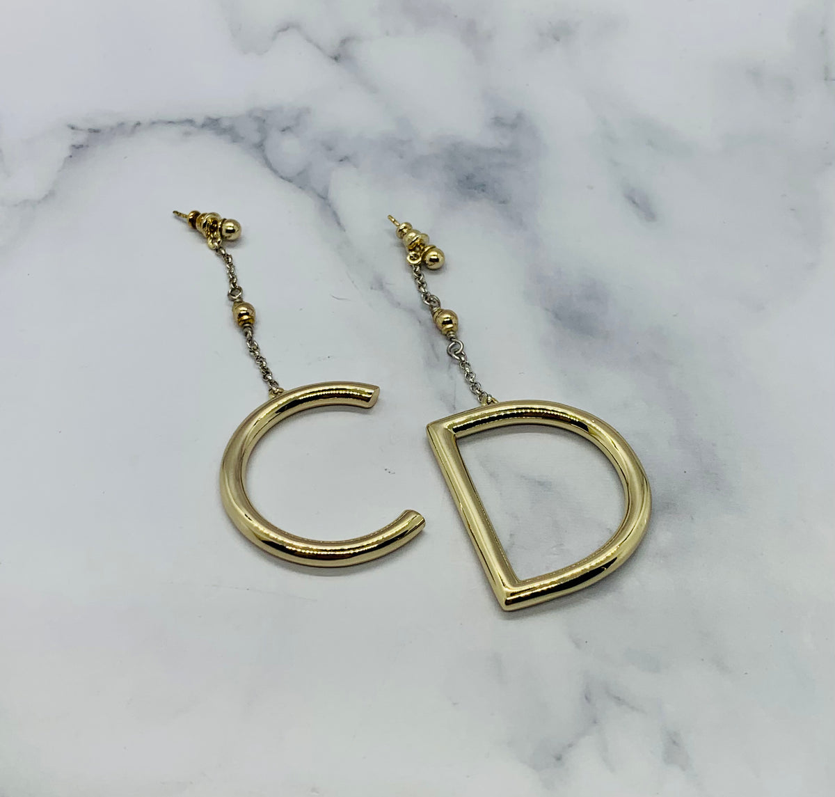 CHRISTIAN DIOR CD Light Gold Pendant Earrings - Pre owned