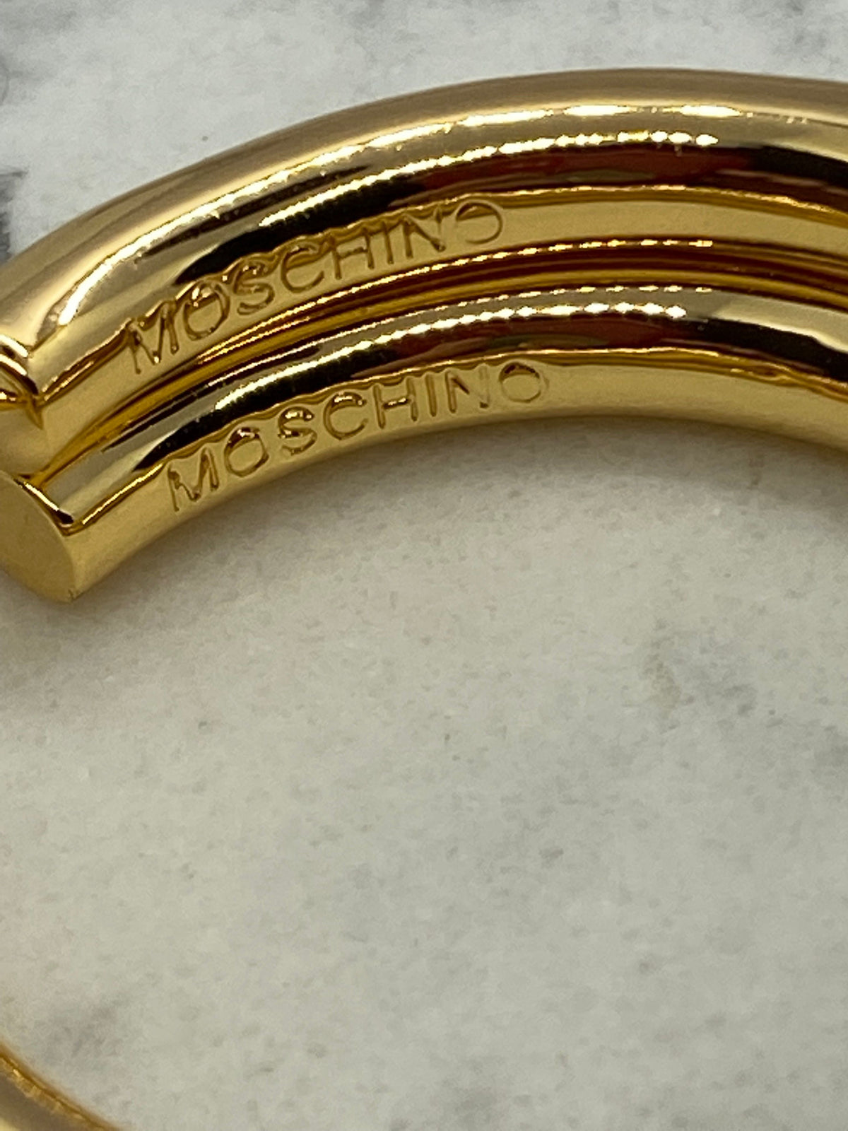 MOSCHINO Gold Tone Monogram Classic Hoop Earrings - Pre owned