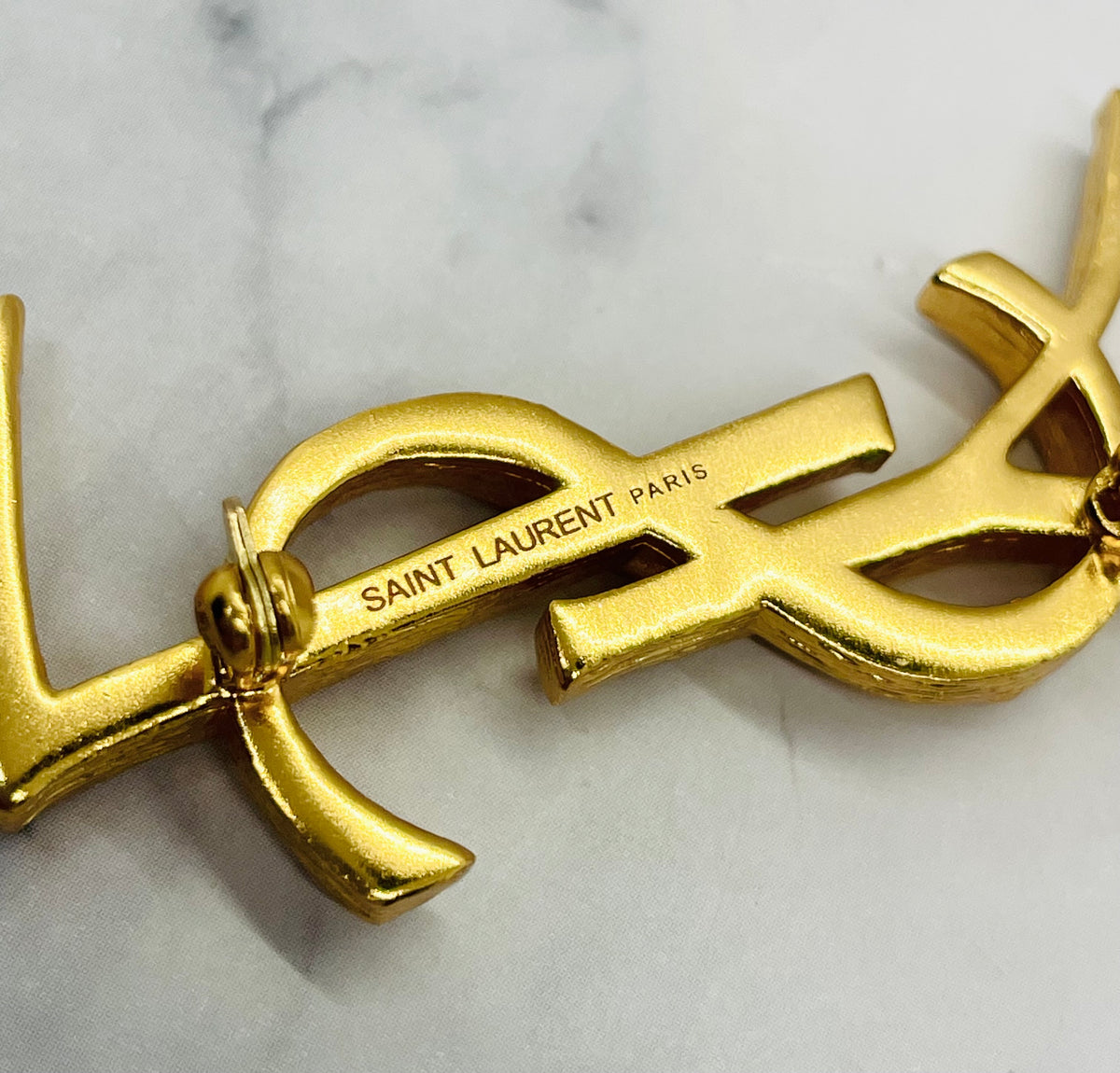 YSL YVES SAINT LAURENT Gold Tone Monogram Brooch Pin - Pre owned