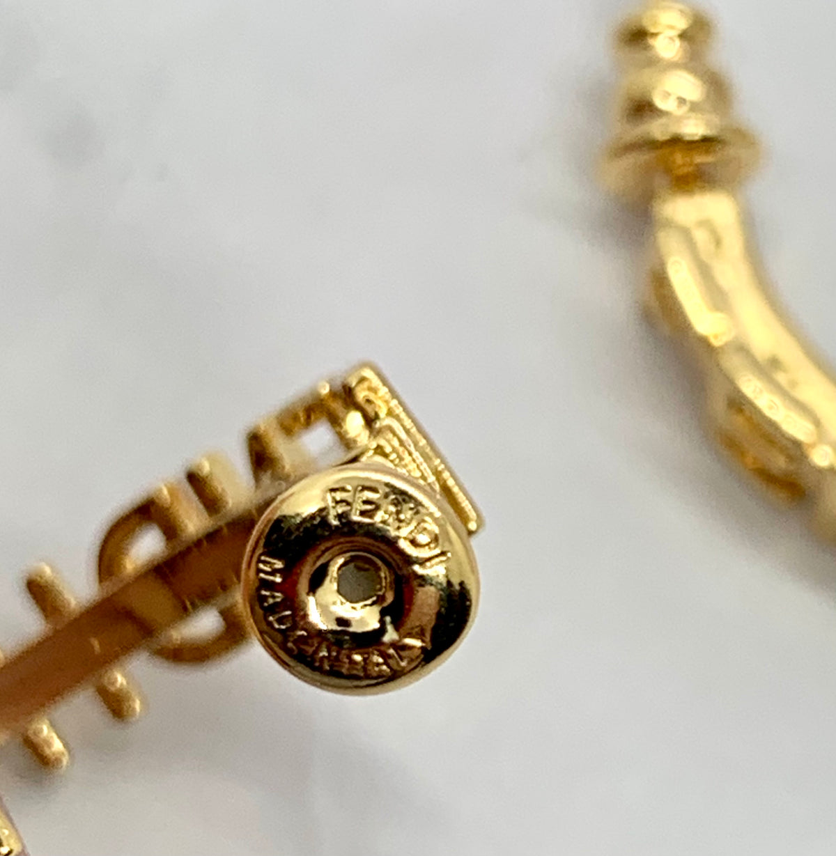 FENDI Monogram Gold Tone Hoop Earrings - Pre owned