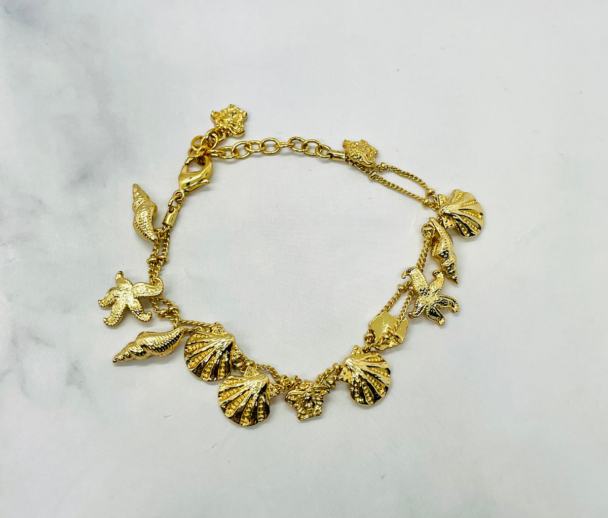 VERSACE Shells Charms Cruise Gold Tone Bracelet - Pre owned