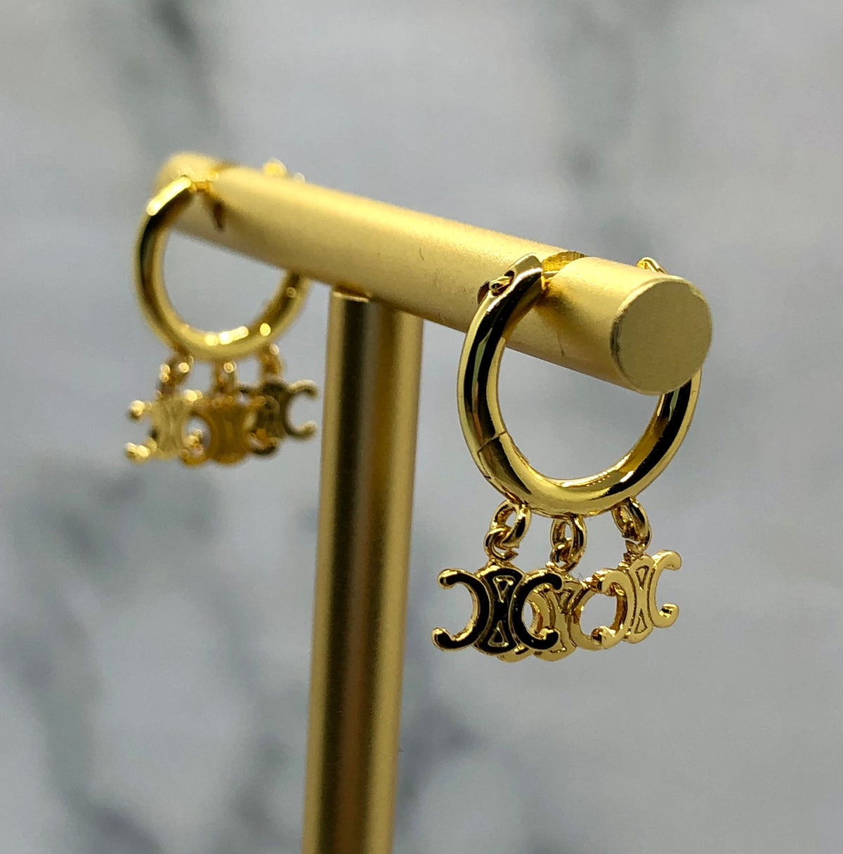 CELINE Gold Tone Monogram Hoop Earrings - Pre owned