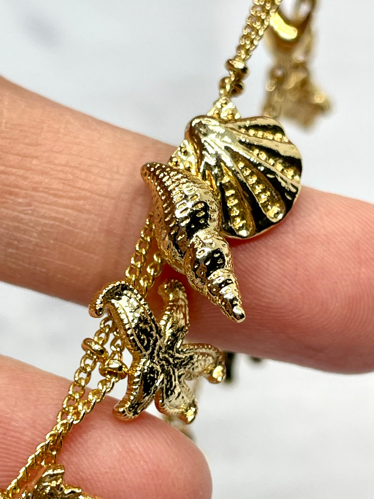 VERSACE Shells Charms Cruise Gold Tone Bracelet - Pre owned