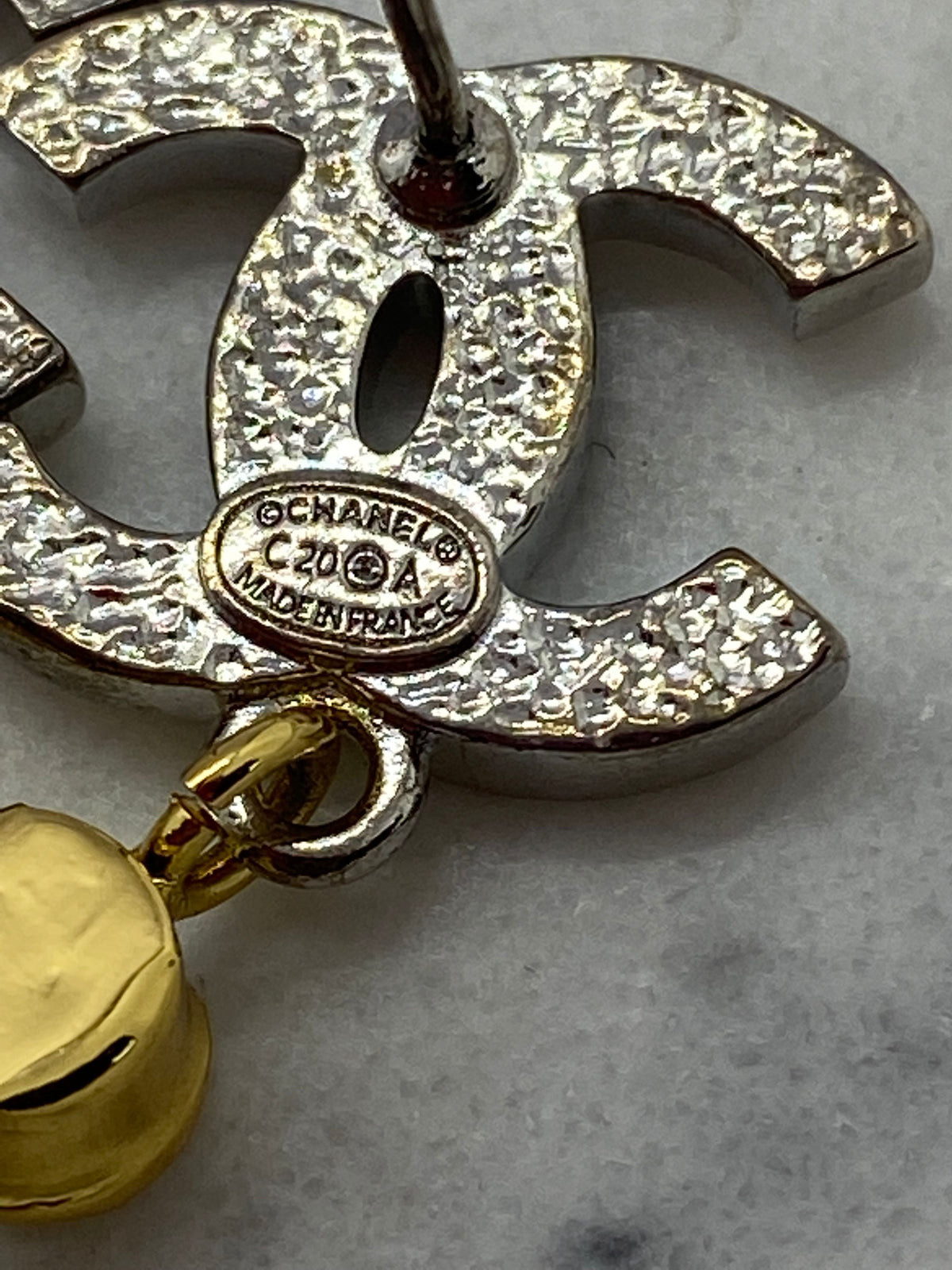 CHANEL CC Gold & Silver Star Pendant Earrings - Pre owned