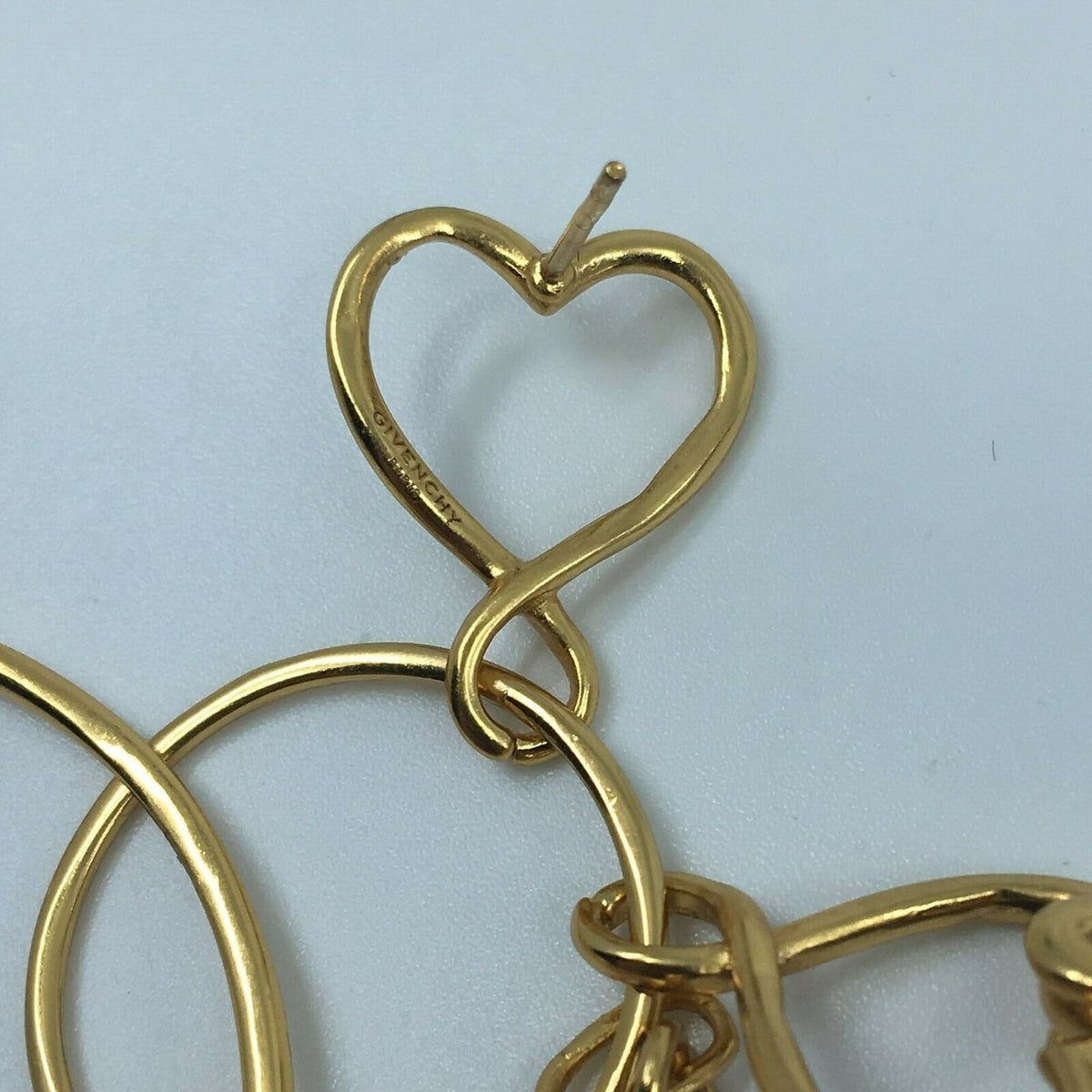 GIVENCHY 2018 gold tone heart and arrows pendant earrings - pre owned