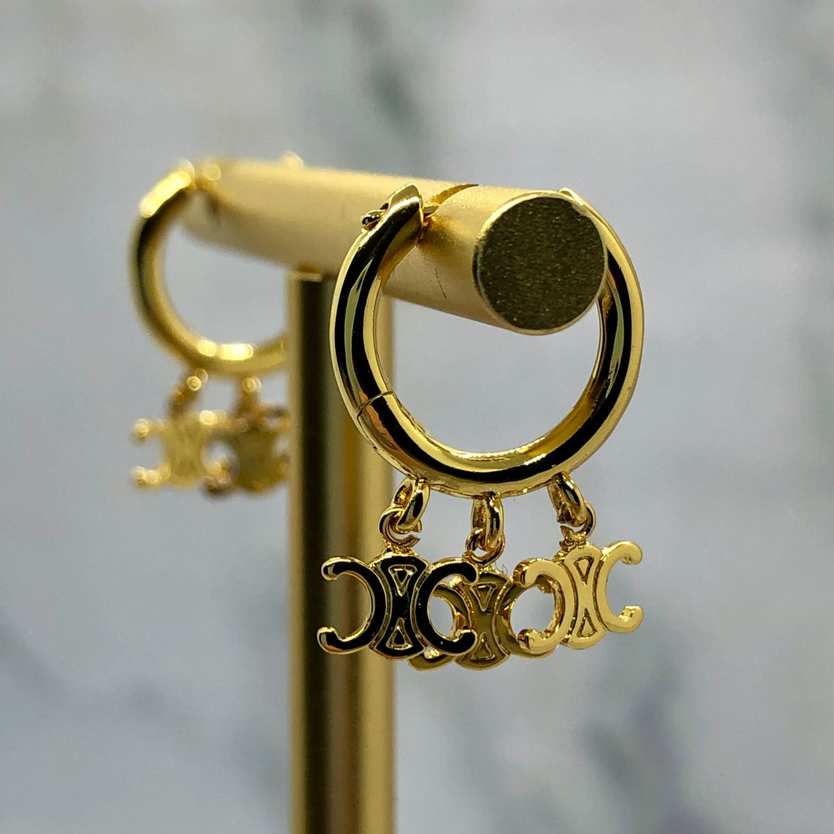CELINE Gold Tone Monogram Hoop Earrings - Pre owned