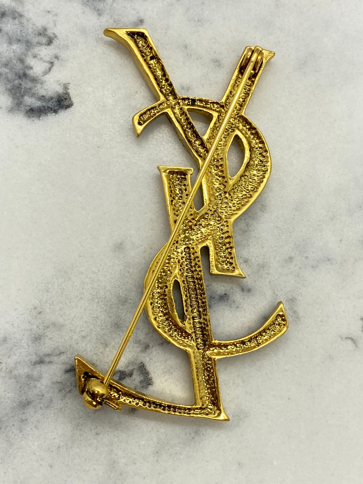 Yves Saint Laurent Gold & Black Enamel Brooch Pin
