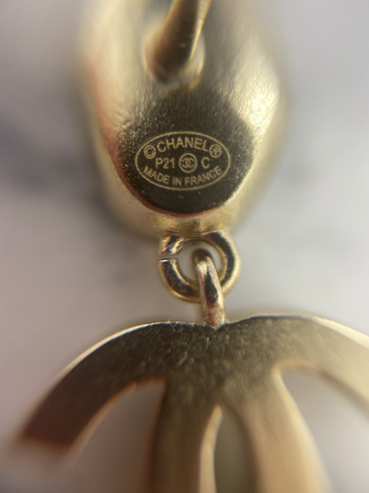 CHANEL CC Gold Tone Rhinestone Pendant Earrings - Pre owned