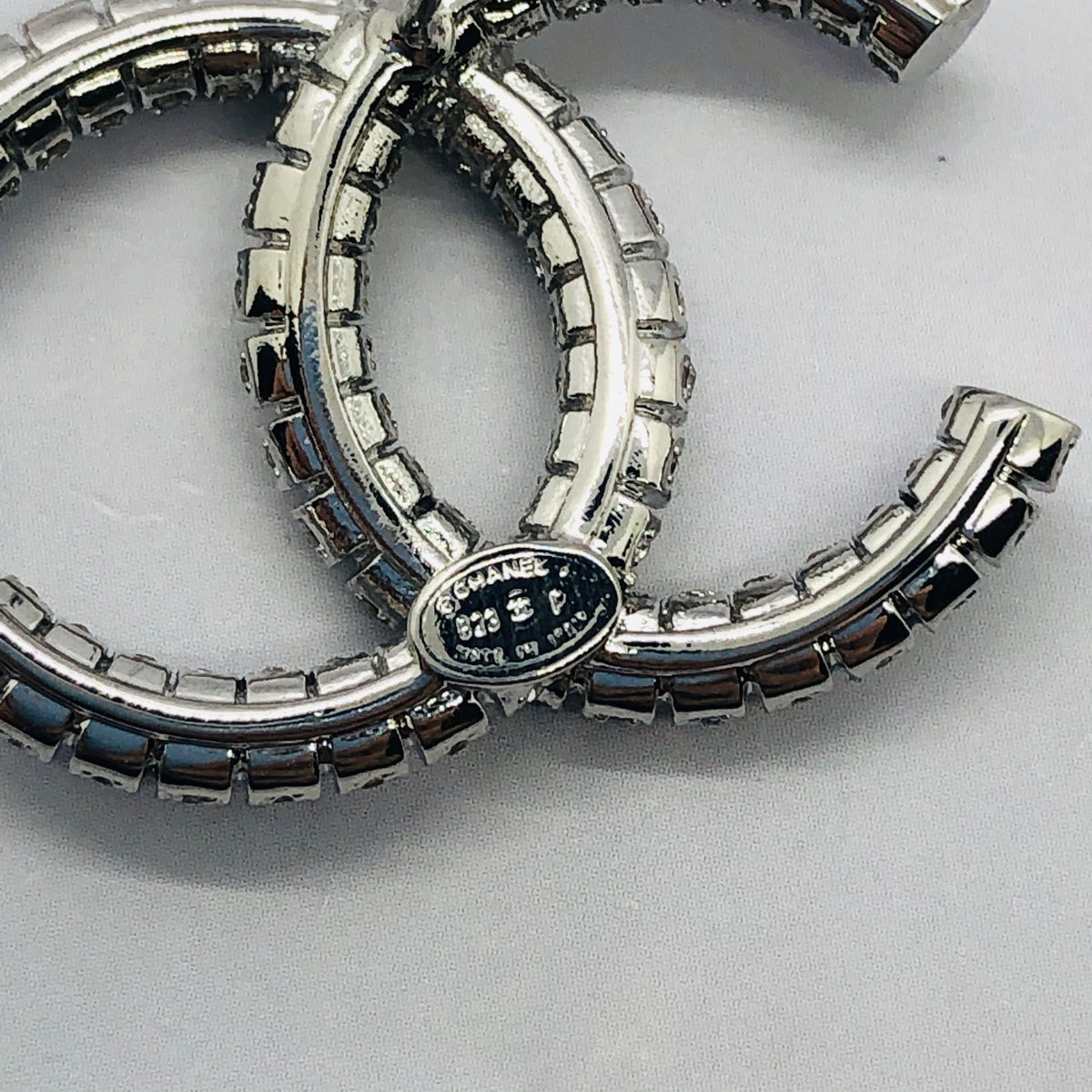 CHANEL CC Silver Tone Rhinestone Earrings - USED