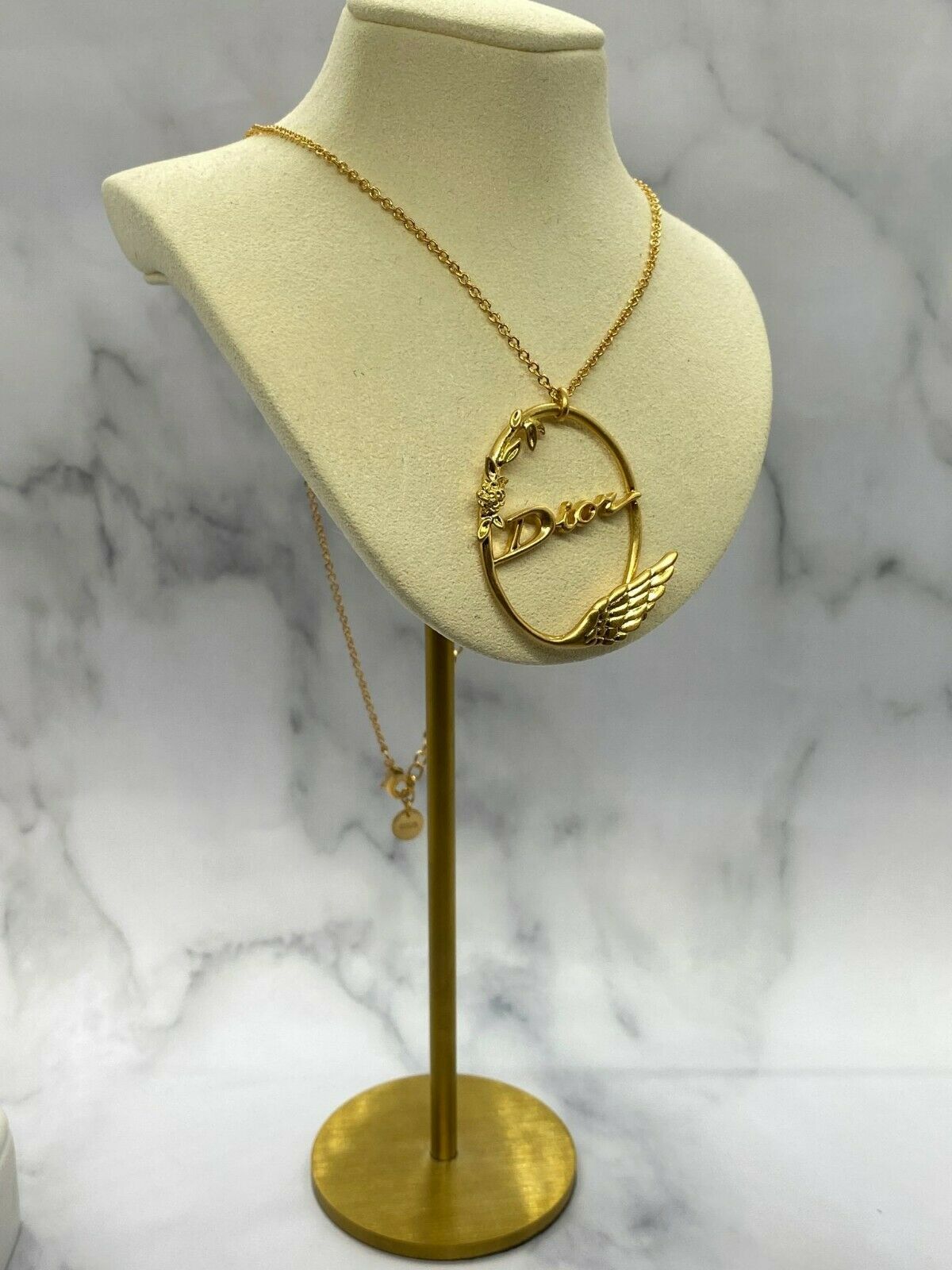CHRISTIAN DIOR Gold Tone Wing Charm Necklace - Pre owned