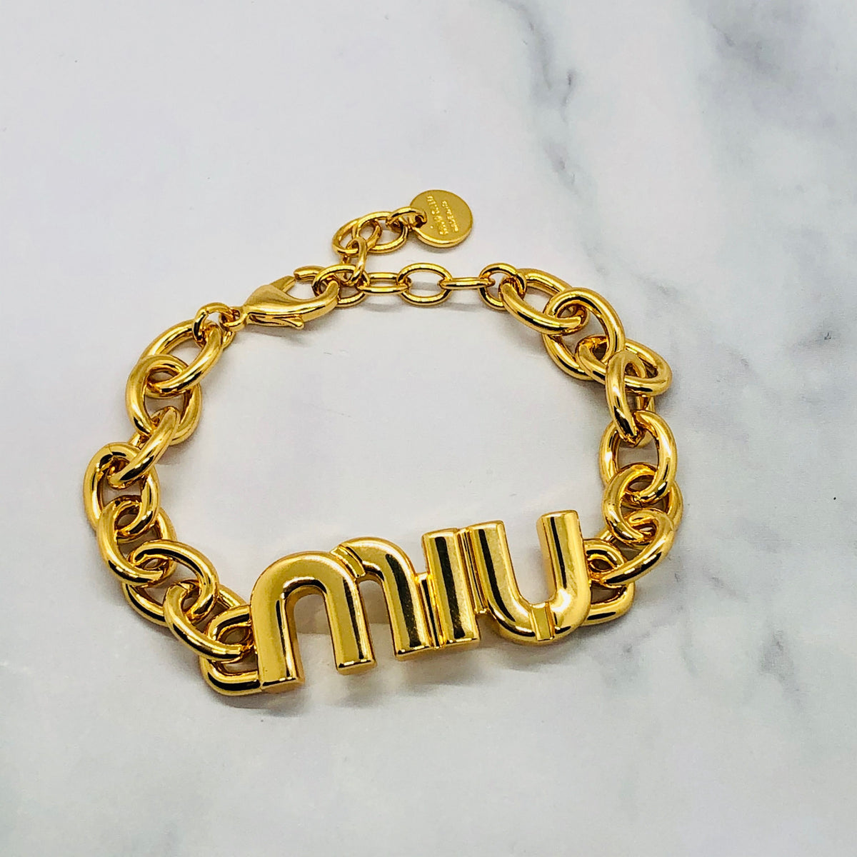 MIU MIU Gold Tone Monogram Bracelet - Pre owned