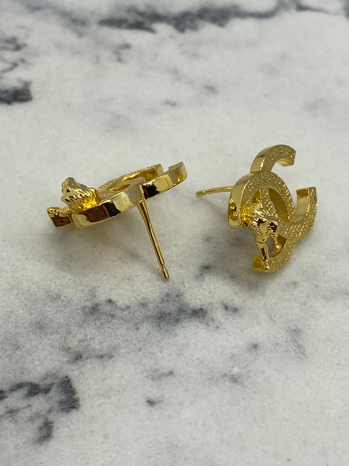 CHANEL CC Gold Tone Lion Earrings - Pre owned