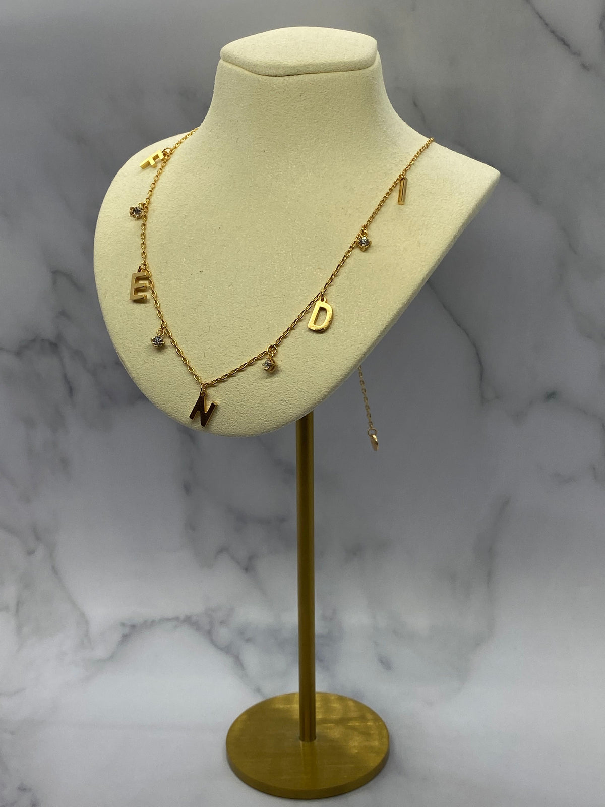 FENDI Gold Tone Rhinestone Monogram Necklace - Pre owned