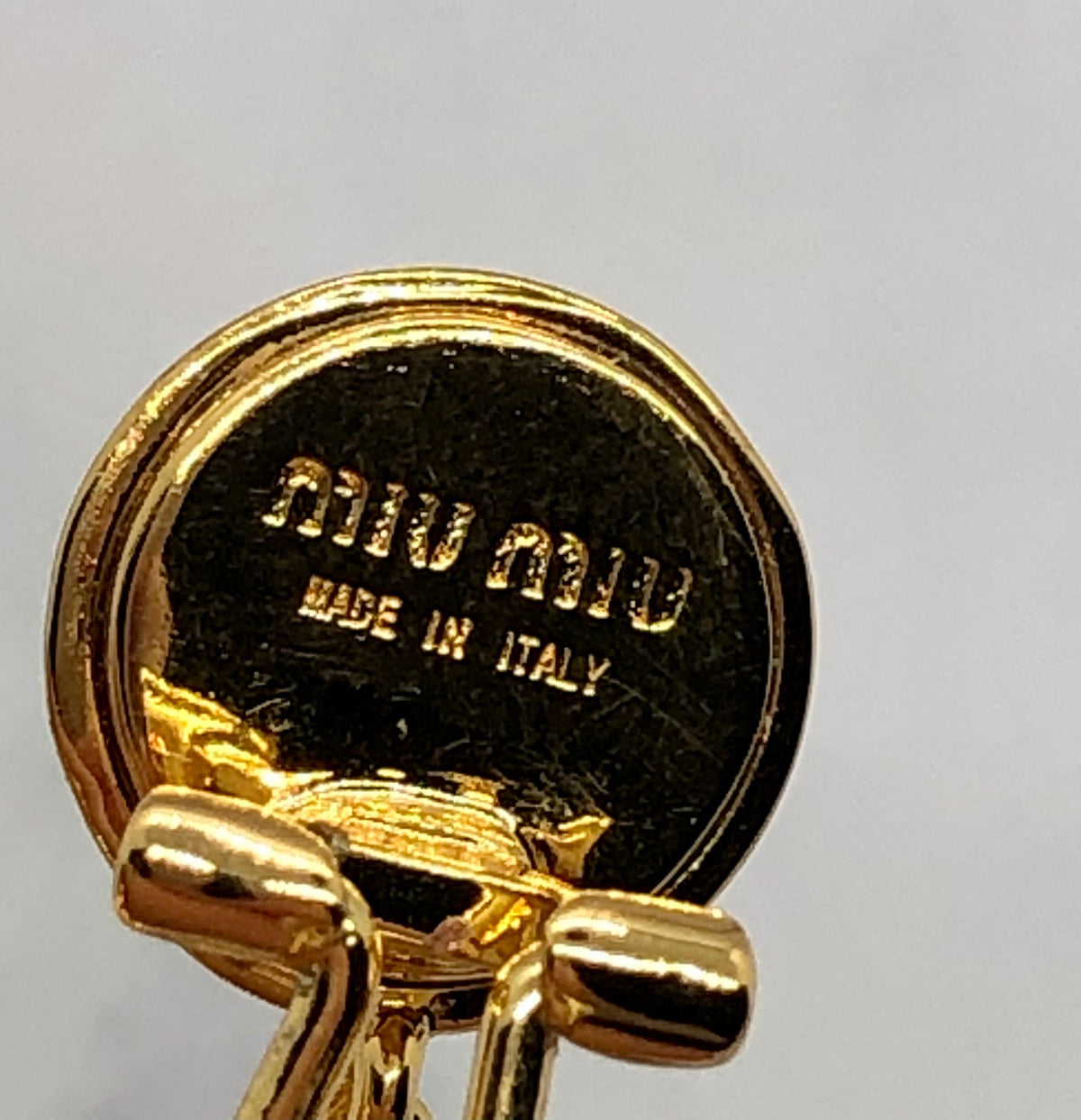 MIU MIU Gold Tone Clip On Hoop Earrings - Pre owned