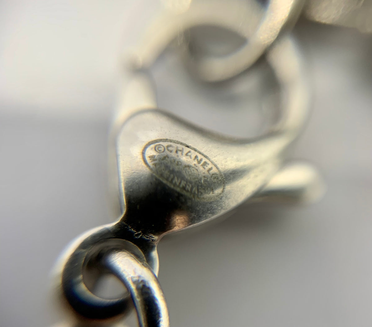 CHANEL CC Silver ToneTassel Bracelet - USED