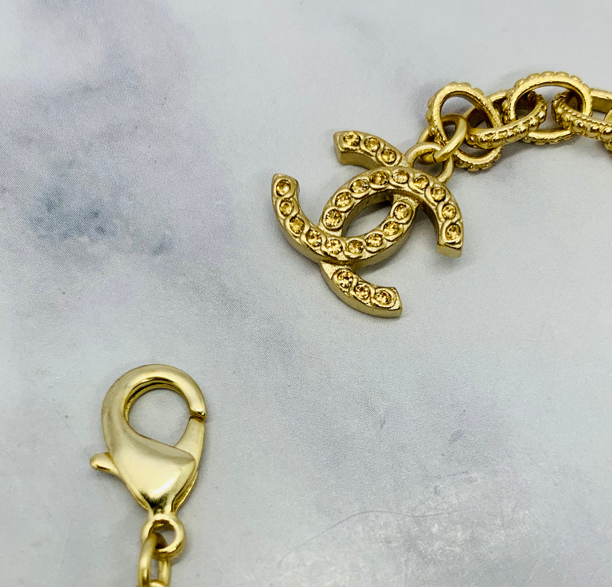 CHANEL CC 2017 Cross Beaded Bracelet - USED