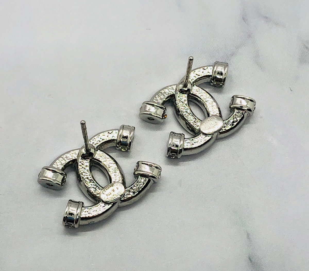 CHANEL CC Silver Tone Rhinestone Earrings - Pre owned