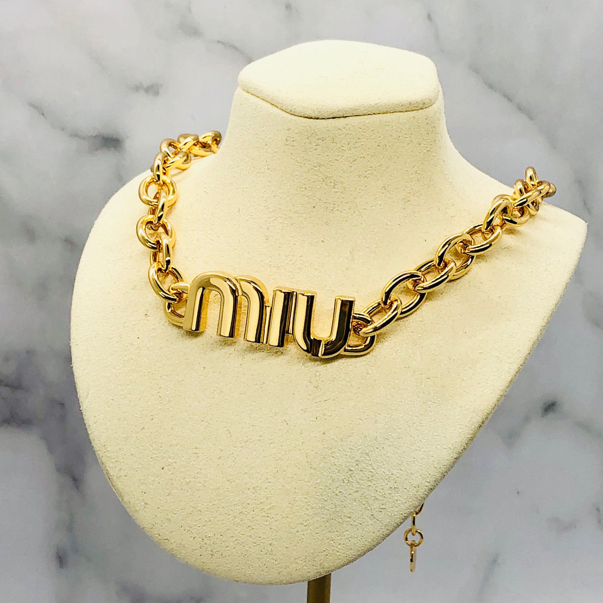 MIU MIU Gold Tone Monogram Necklace - Pre owned