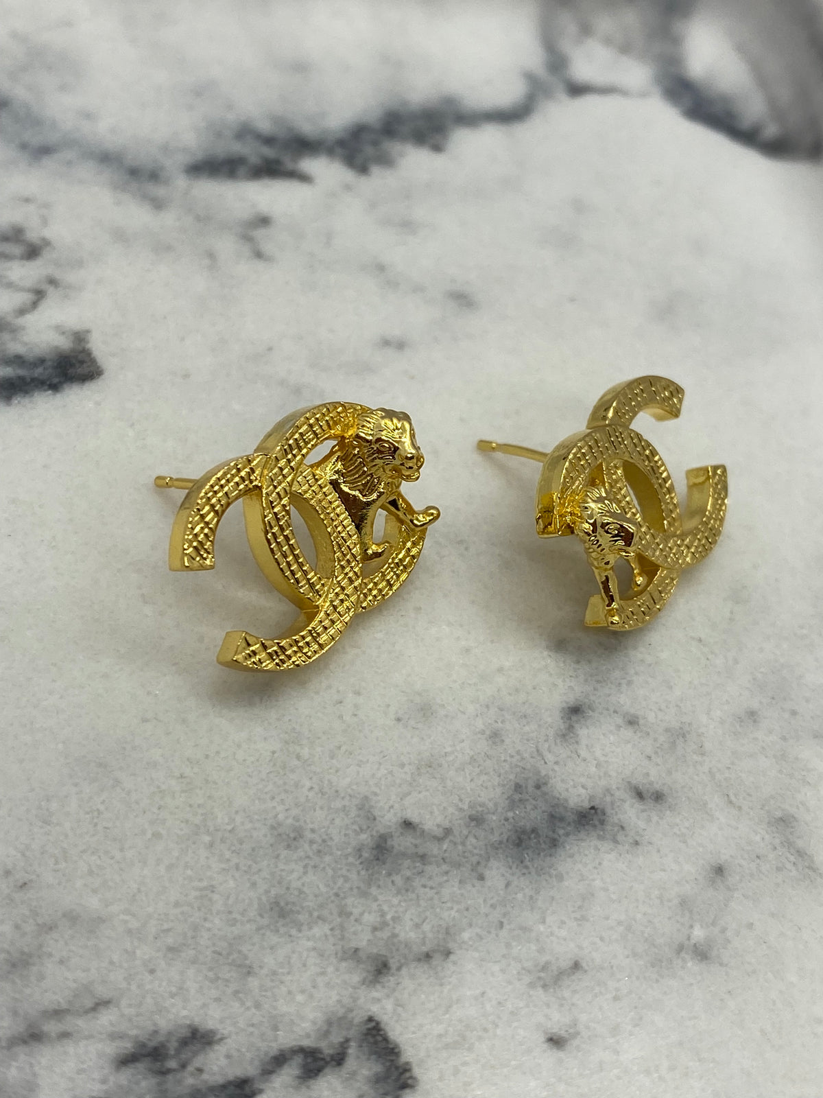 CHANEL CC Gold Tone Lion Earrings - Pre owned