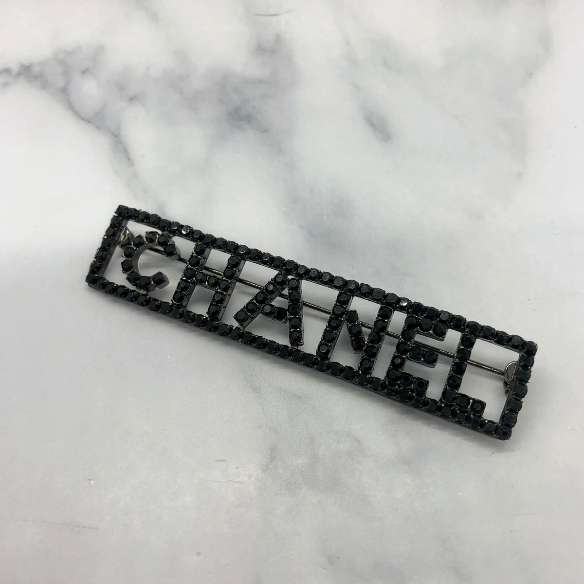 CHANEL Black Rhinestone Name Plate Brooch Pin - Pre owned