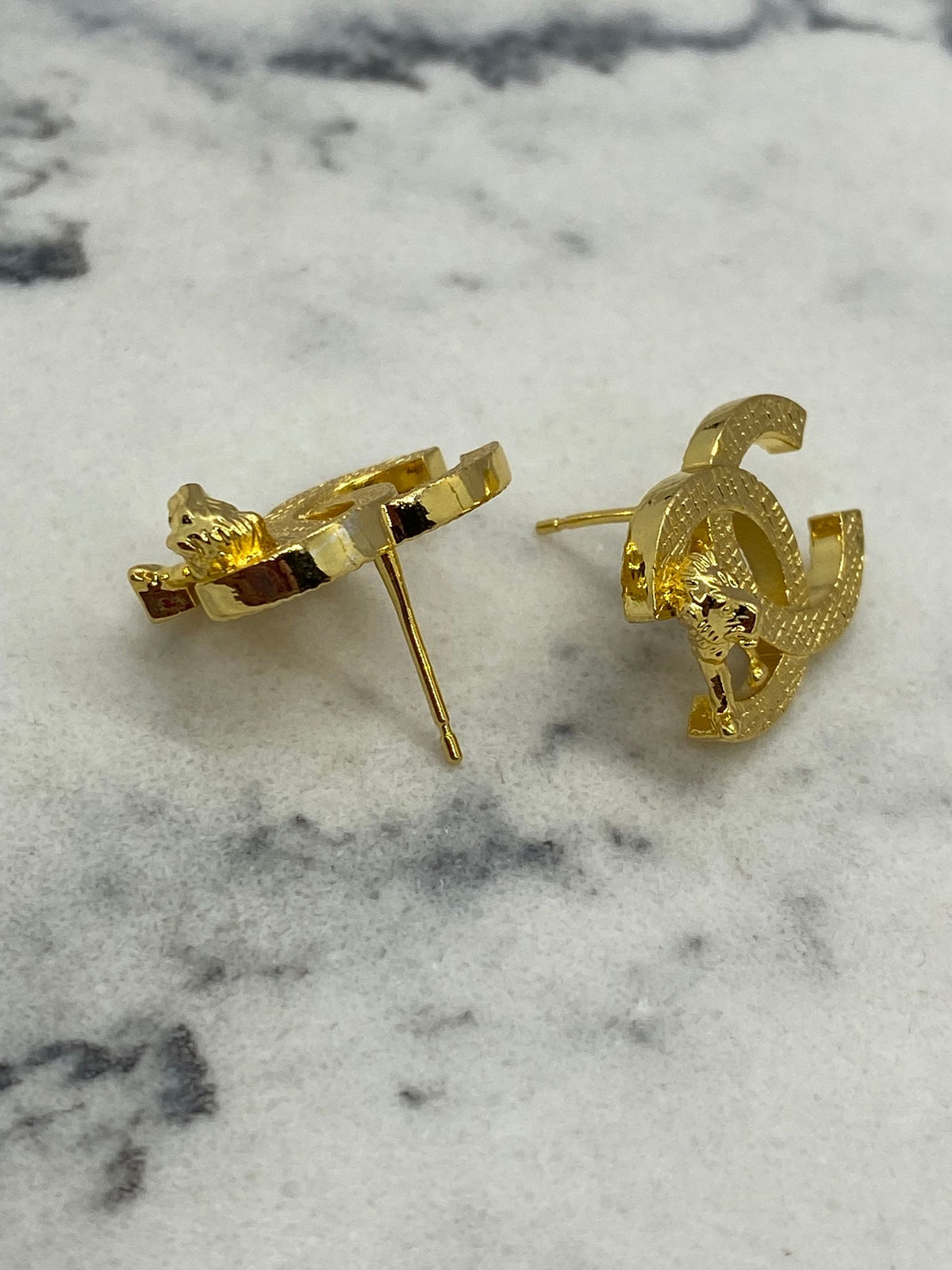 CHANEL CC Gold Tone Lion Earrings - Pre owned