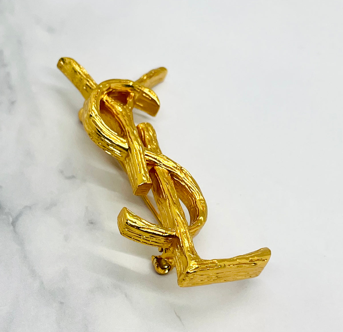 YSL YVES SAINT LAURENT Gold Tone Monogram Brooch Pin - Pre owned