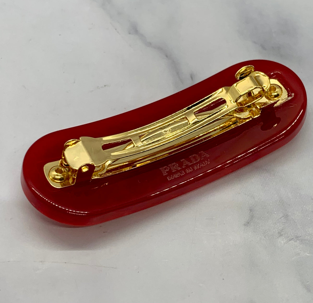 PRADA Red Acrylic Gold Stud Hair Clip Barrette - Pre owned