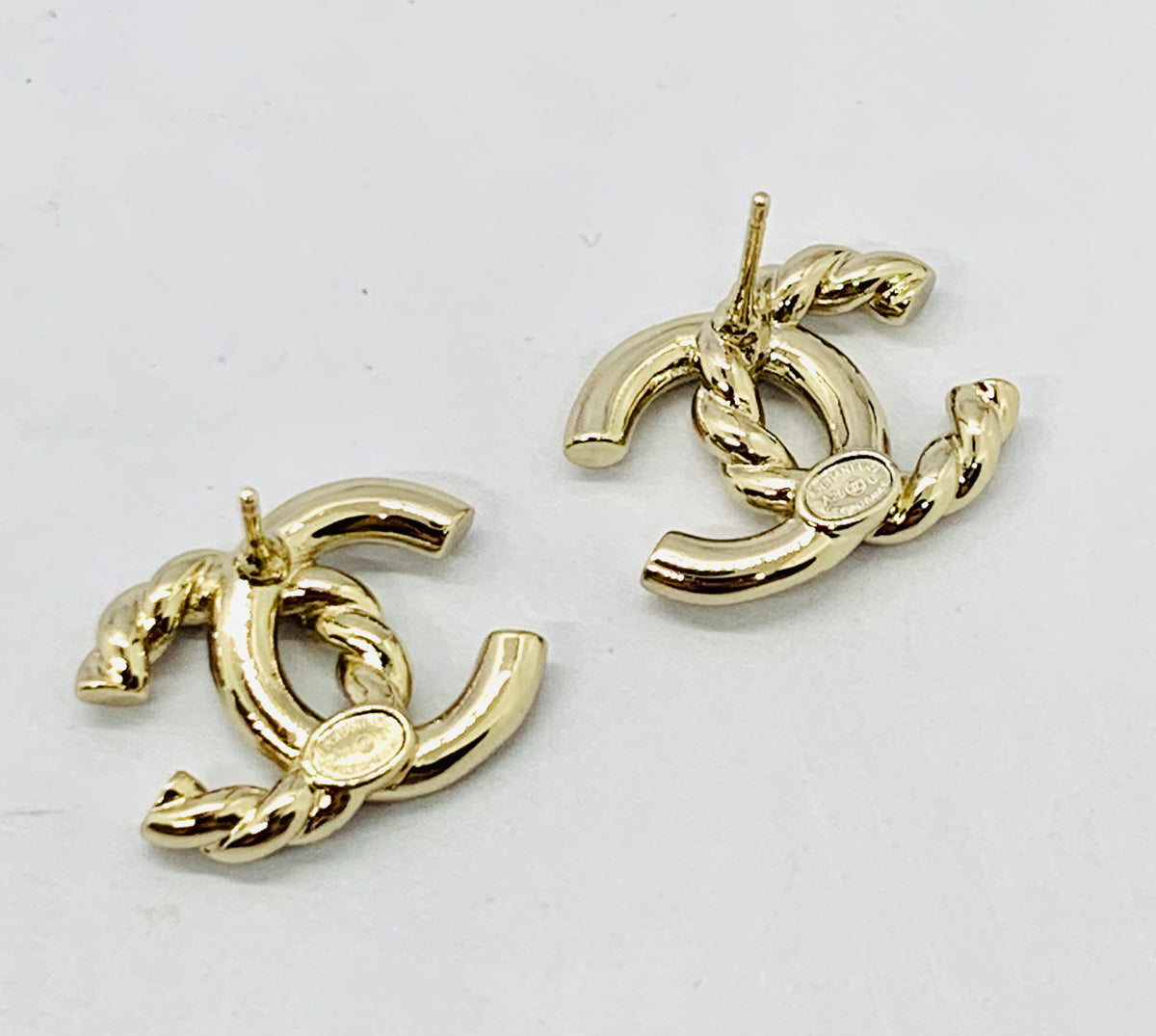 CHANEL CC Gold Tone Twist Earrings - Pre owned