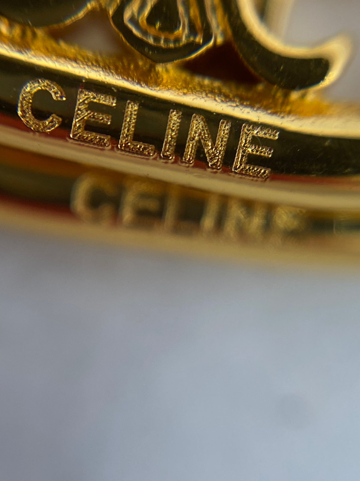 CELINE Gold Tone Monogram Pendant Earrings - Pre owned