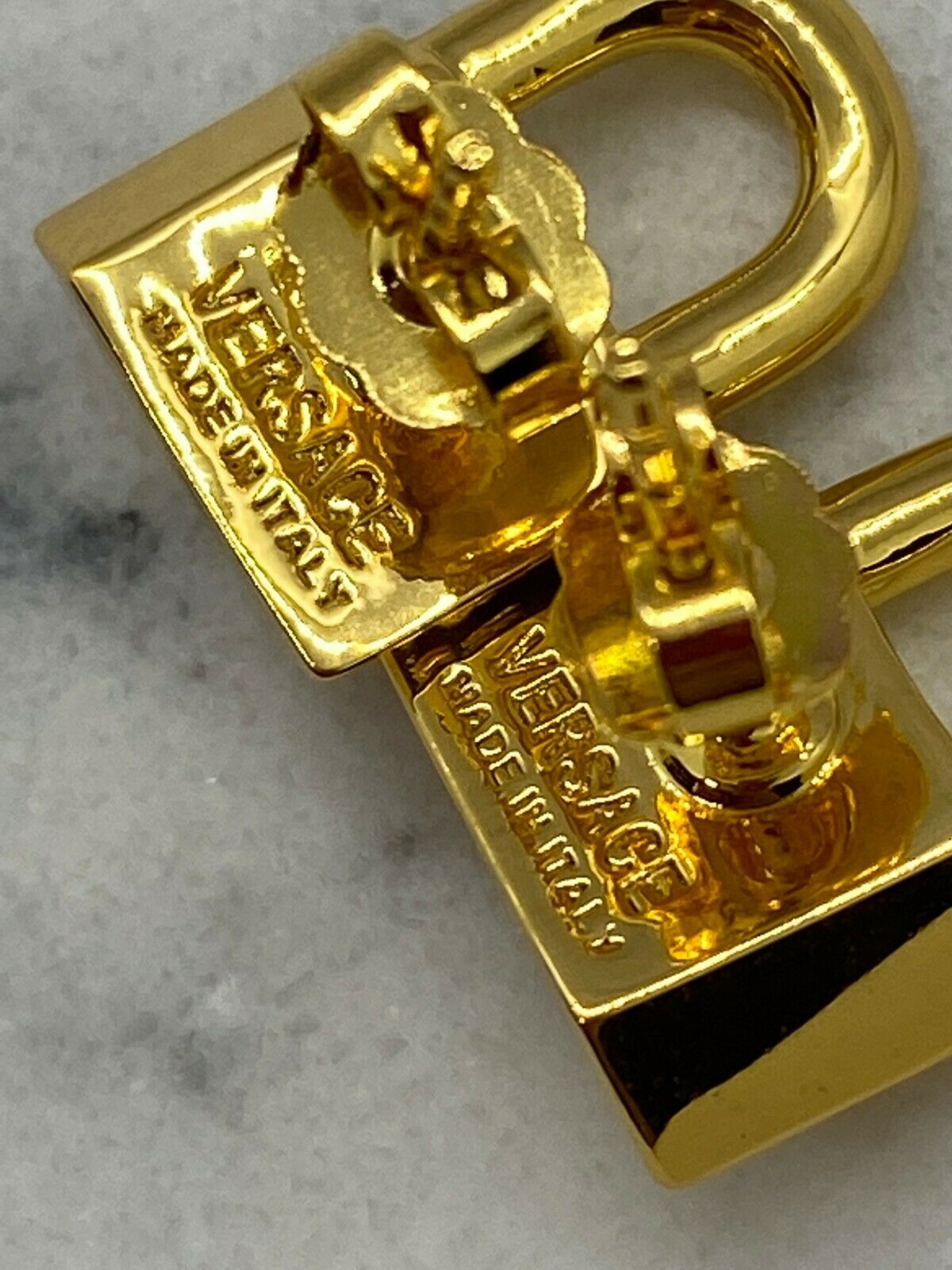 VERSACE Medusa Lock Gold Tone Earrings - Pre owned