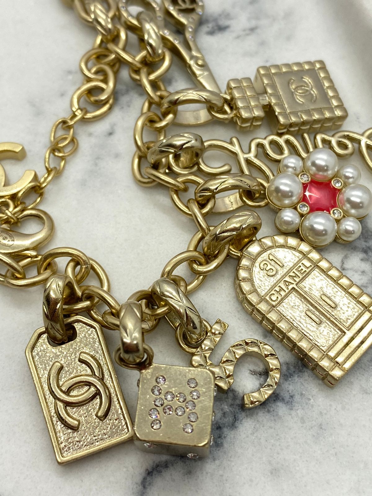 CHANEL CC Gold Tone Charm Bracelet - Pre owned