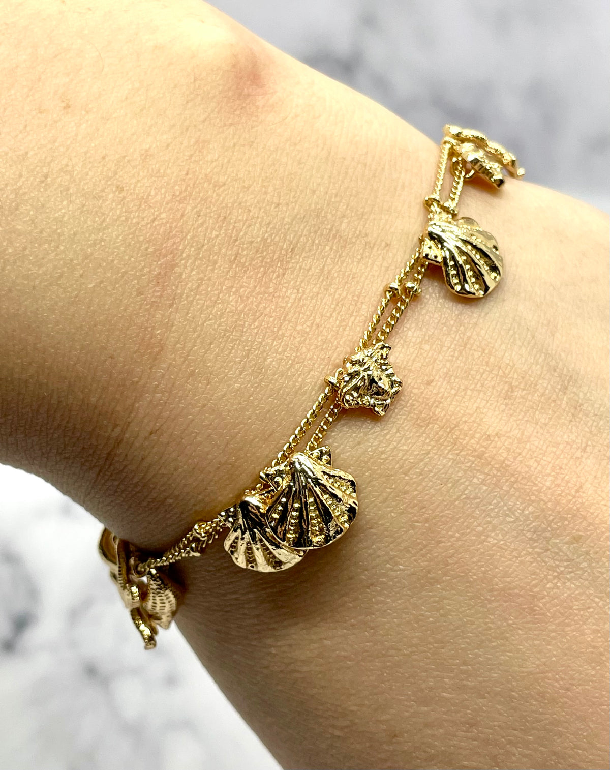 VERSACE Shells Charms Cruise Gold Tone Bracelet - Pre owned